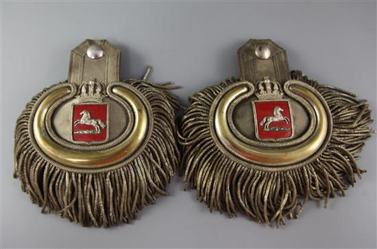 A pair of 19th century Continental silvered brass and silver braid epaulettes, 6in.